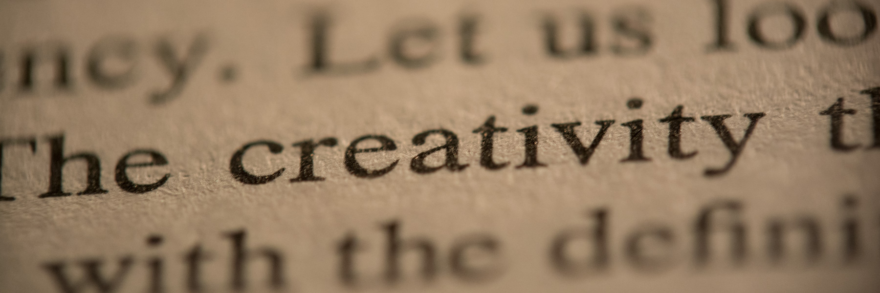 The word creativity on a printed page in close focus